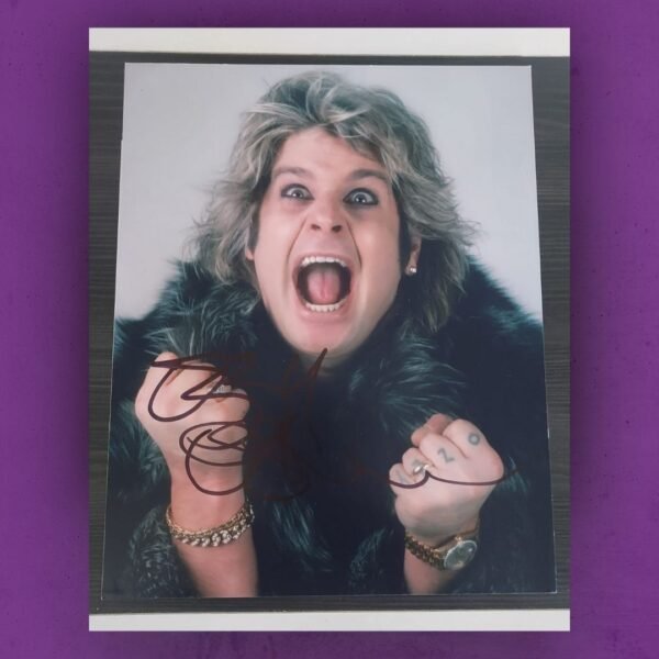 Ozzy Osbourne hand-signed photo by the Black Sabbeth prince of darkness.